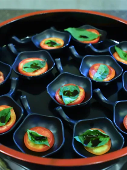 Simple yet classic Caprese bites. Fresh tomato and basil are drizzled with balsamic glaze, served in individual spoons for an elegant and easy-to-eat appetizer.
