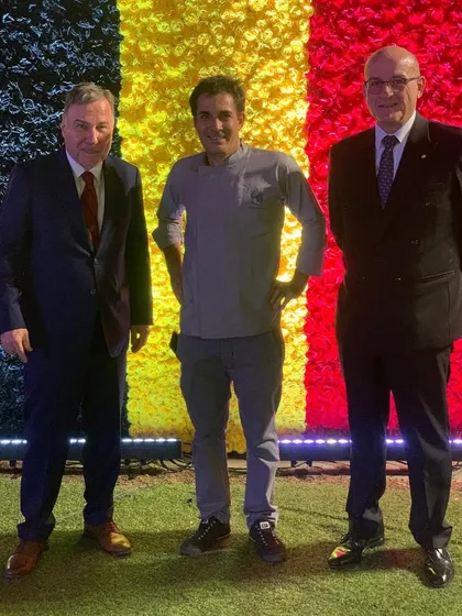 Posing with officials at the Belgian King's Day event. We are honored to be the trusted catering partner for consulates and diplomatic functions, delivering exceptional quality and service for high-stakes events.