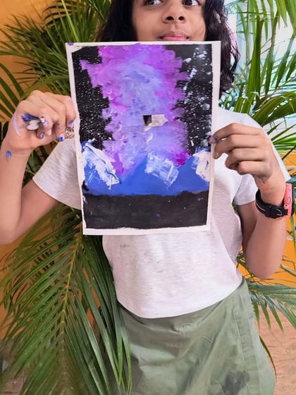 Another student's interpretation of the aurora, this one with a mysterious house nestled in the mountains.