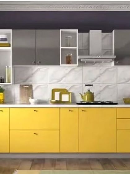 This kitchen makes a bold statement with vibrant yellow base cabinets and grey upper units. The design includes open white shelves for a touch of visual interest and easy access to everyday items.
