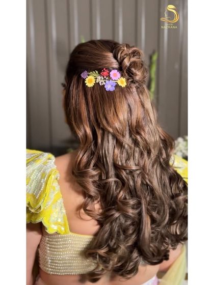 A close-up of the floral arrangement, showing the beautiful mix of colours.