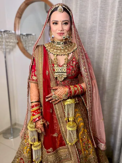 The complete look for my stunning Rajasthani bride. The makeup is rich and colorful, matching the grandeur of her traditional attire and jewelry.