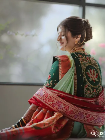 A graceful shot of the bride, her traditional hairstyle adding to the overall picture of elegance.