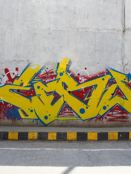 A full shot of my "No War" piece, combining wildstyle lettering with a message. The yellow, red, and blue color scheme is a nod to the cause.