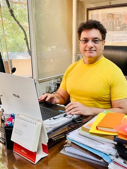 Even during court vacations, the passion for my profession never stops. Here I am working on client cases from my Delhi High Court office.