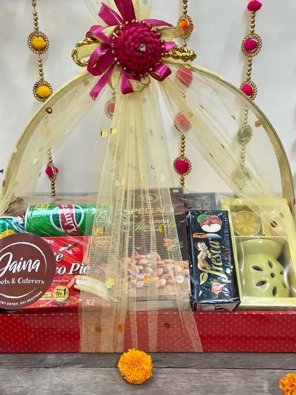 Our Diwali hampers are a whole vibe! This one is packed with sweets, savouries, drinks, and even a beautiful aroma diffuser. I make sure every hamper feels like a complete celebration in a box.