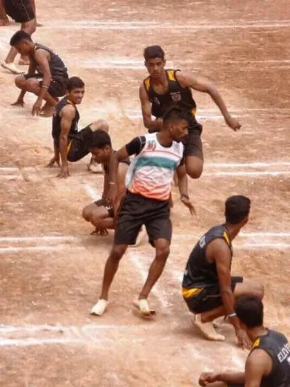 Dipesh More starting his run, ready to attack.