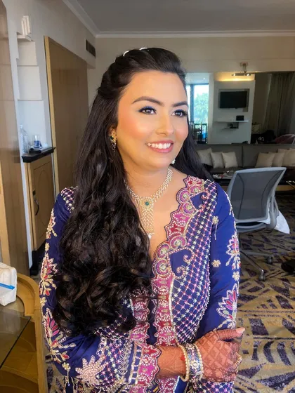 Bansi looking radiant and happy, ready for her mehendi ceremony.