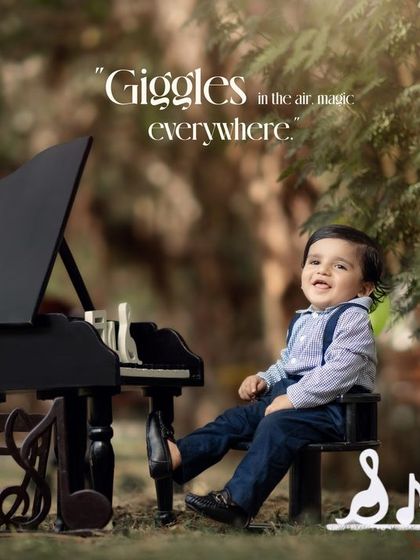 Giggles in the air, music everywhere. This little boy's smile lights up the park as he plays his mini piano.