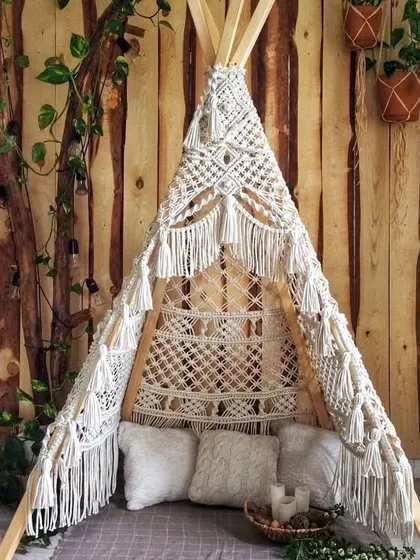 Create a magical corner for your kids or a cozy photo spot with our handmade macrame teepee. It’s a unique piece that adds a playful and stylish touch to any room, perfect for parties, picnics, or just a quiet afternoon.