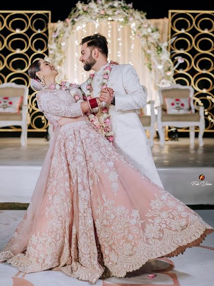 The pure joy of a dance between the newly married Lakshay and Shweta. This shot captures the movement and happiness that follows the formal ceremonies.