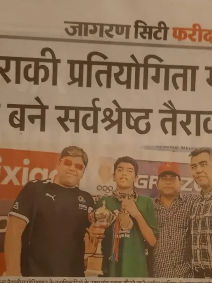 Our champions making headlines. A local newspaper clipping celebrating Aarez Asif's performance as the best swimmer in the competition.