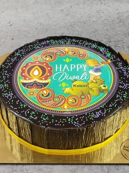 This custom Diwali cake features a vibrant, edible print with a festive diya and paisley design. It's a perfect example of how we can personalize our cakes to become a centerpiece for your family's festival of lights celebration.