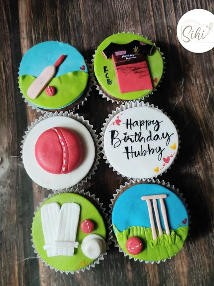 For the ultimate cricket fan, this set includes an RCB jersey, a cricket ball, bat, stumps, and pads. It's the perfect treat for celebrating a big match or a birthday.