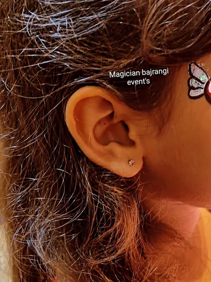 Sometimes a simple design is all that's needed. This small winged heart is a quick, cute, and popular choice for face painting.