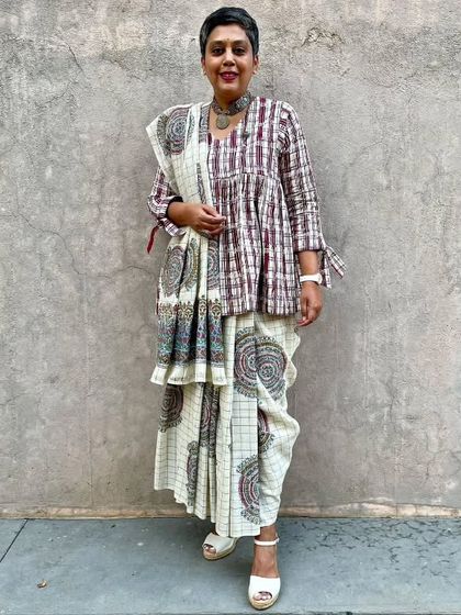 A participant at our saree revival workshop, showcasing a beautifully draped and overprinted saree. These workshops are a wonderful way to give beloved heirlooms a new lease of life.