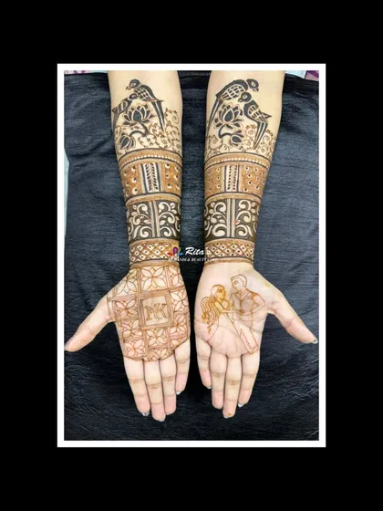 The design before the henna paste is applied for shading, showing the clean outlines of the couple portrait and bird motifs.