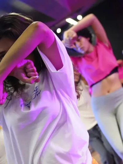 Dancers completely in the zone during an intensive choreography session.