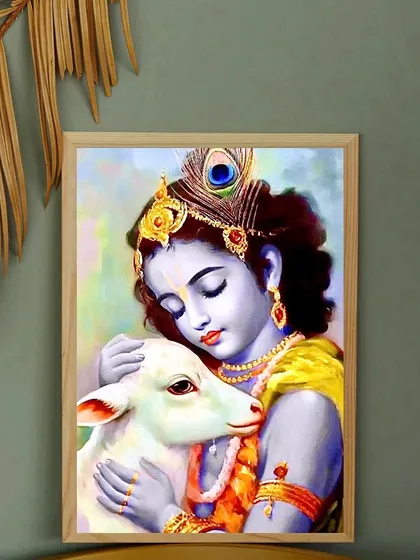 This is another view of the painting showing Krishna embracing a calf, highlighting its gentle and loving theme. The vertical orientation makes it suitable for various wall spaces, bringing a sense of compassion and tranquility.