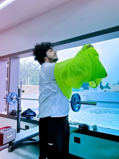 A cool shot capturing the mix of rain and sunlight during a workout. No excuses, no matter the weather.