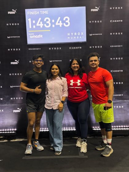 Posing with my support system after the Hyrox Mumbai race. Having friends and family there to cheer you on makes a world of difference.