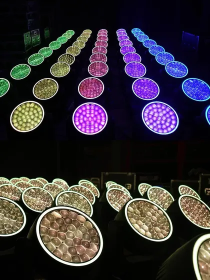 The Prolights Astra Wash fixtures displaying a full spectrum of vibrant colors, demonstrating their high-quality RGBW LED engine.