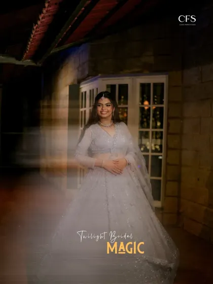 "Twilight Brides Magic." A magical, long-exposure shot of the bride in a flowing grey lehenga, creating a ghostly and ethereal effect that is truly unique.