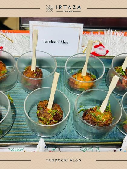 Tandoori Aloo served in individual glasses. The smoky flavor of the potato combined with fresh herbs makes this a standout vegetarian starter.