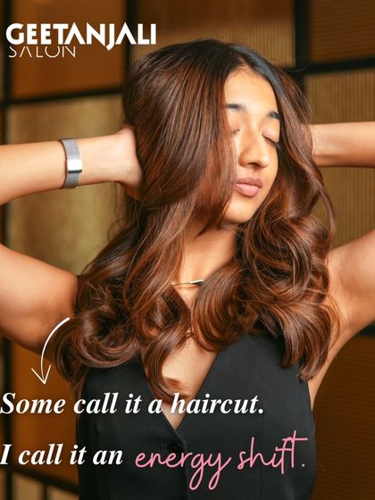 Some call it a haircut. I call it an energy shift. This image captures the transformative power of a new style.