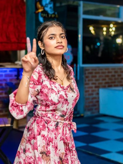 A guest striking a pose on the dance floor.