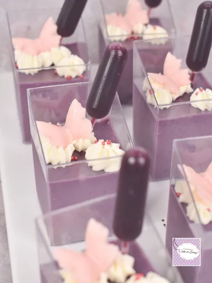 These blueberry pannacotta cups were part of our fairy garden dessert table. They come with a pipette of blueberry coulis so guests can add as much sauce as they like.