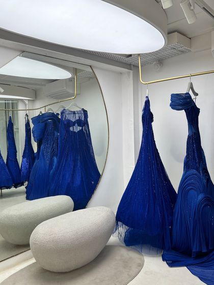 A glimpse into a designer's studio. These stunning blue gowns are the kind of pieces I love sourcing for my clients for their special events.