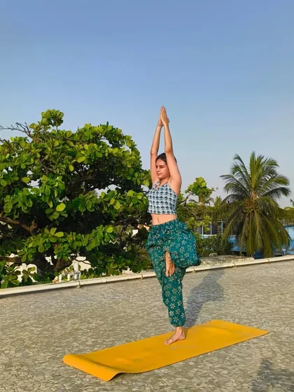 A steady body helps create a steady mind. While my therapy sessions focus on practical solutions for health issues, we also embrace the beauty and grace of asana. This is Vrikshasana, the tree pose, which cultivates balance, focus, and a connection to the earth.