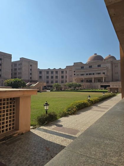 The beautiful grounds of the Lucknow High Court. The majestic architecture reflects the enduring legacy of justice in our country.