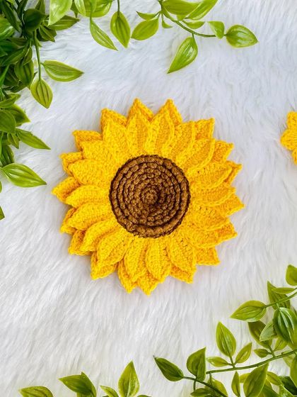 A beautiful double-layered crochet sunflower. The extra layer of petals gives it a very full and realistic look.