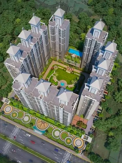 This aerial view shows a large-scale residential complex we landscaped. Our design includes a central green courtyard, a swimming pool area, and decorative roadside planting, creating a complete and cohesive green ecosystem for the entire community to enjoy. We handle projects of all sizes, from a single home to an entire society.