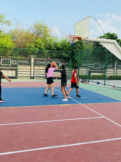A young female player looks to score in the paint.