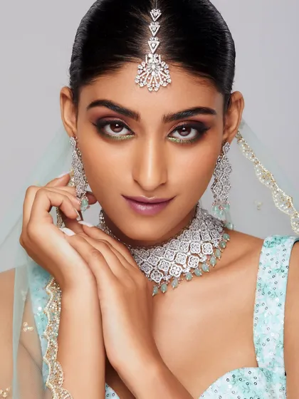 A breathtaking diamond bridal look from our Bangalore academy, featuring a cool-toned smokey eye that complements the sparkling jewelry perfectly.