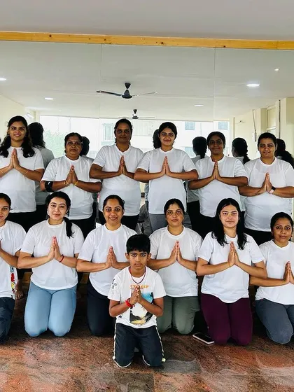 Our community stands together in a gesture of gratitude on International Yoga Day. It’s a day to honor the practice that unites us.