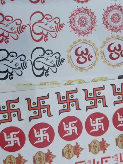 These sticker sheets feature traditional Indian symbols like Om, Swastik, and Ganesha. They are perfect for decorating products for religious festivals and pujas.
