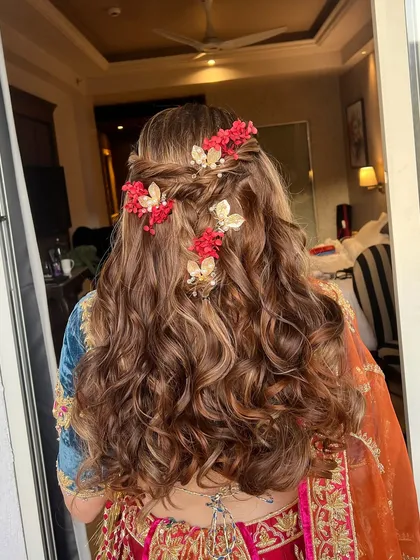 A close-up of the detailed Mehendi hairstyle, perfect for a bride who wants a unique and memorable look.