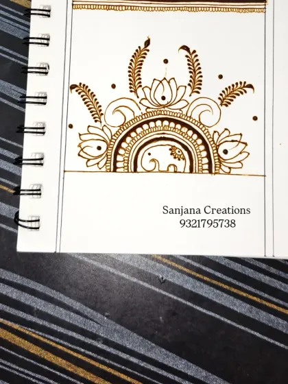 Another look at the completed beginner-friendly elephant and lotus design. Mastering these small but elegant motifs is the first step on your journey to becoming a mehndi artist.