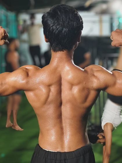 The result of countless pull-ups and rows. A strong, sculpted back is the foundation of all pulling strength in calisthenics.