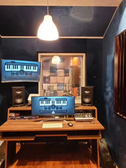 The command center where your music gets its final polish. Our control room features a digital audio workstation, high-quality studio monitors, and a comfortable setup for long production sessions.