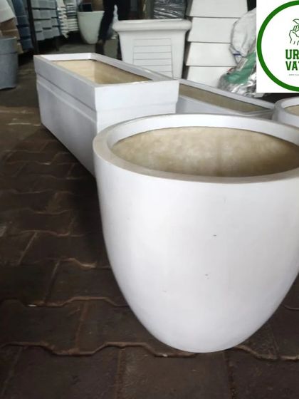 More of the large, white, U-shaped pots.