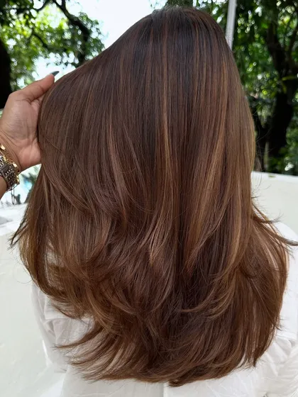 I love that this client comes all the way from New York for her hair sessions. This is a classic color refresh, where I blend her roots and brighten her highlights for a seamless look.