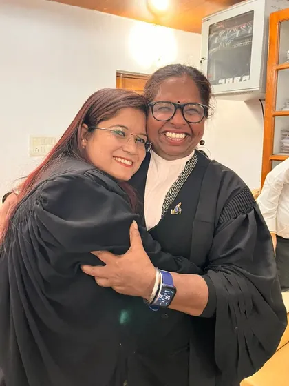 Sharing a happy moment and a hug with a senior colleague at the Supreme Court. The camaraderie among lawyers is special.