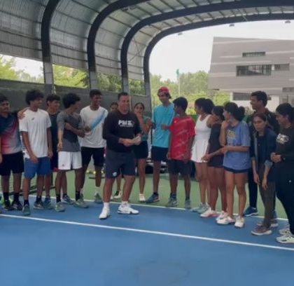 A candid moment during a team celebration on the court.