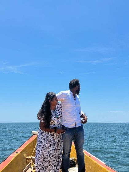 Posing for a picture-perfect moment on the boat, creating memories that will last a lifetime.