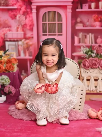 A happy smile from our pink blossom baby. The vibrant colors and textures of this set make for stunning photographs.